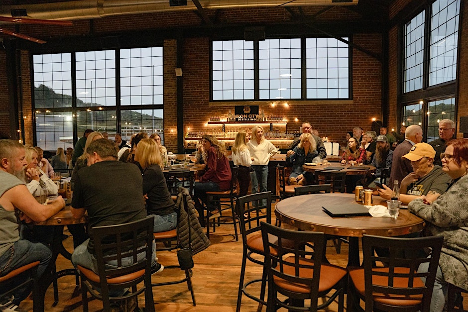 A bar area full of people.